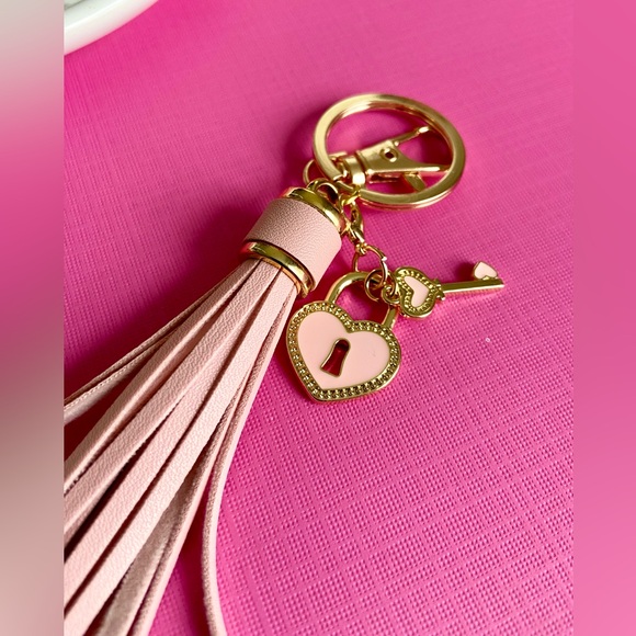 NEW. Bag charm or keychain. Faux leather tassel, removable heart lock charms - Picture 1 of 5